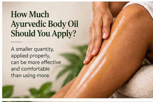 Applying a small amount of Ayurvedic body oil to the skin